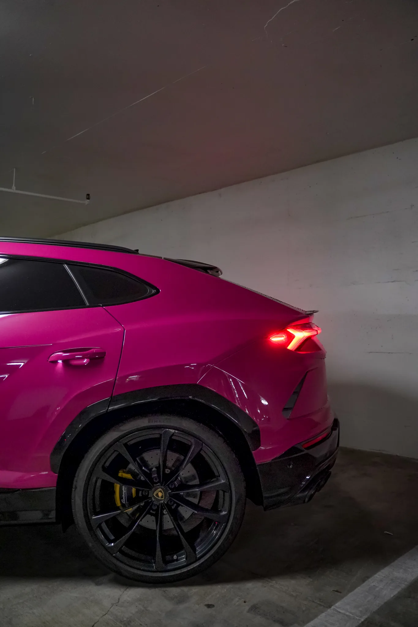 Rubystar Pink Lamborghini Urus rear three-quarter — exotic SUV for rent in DC and Virginia