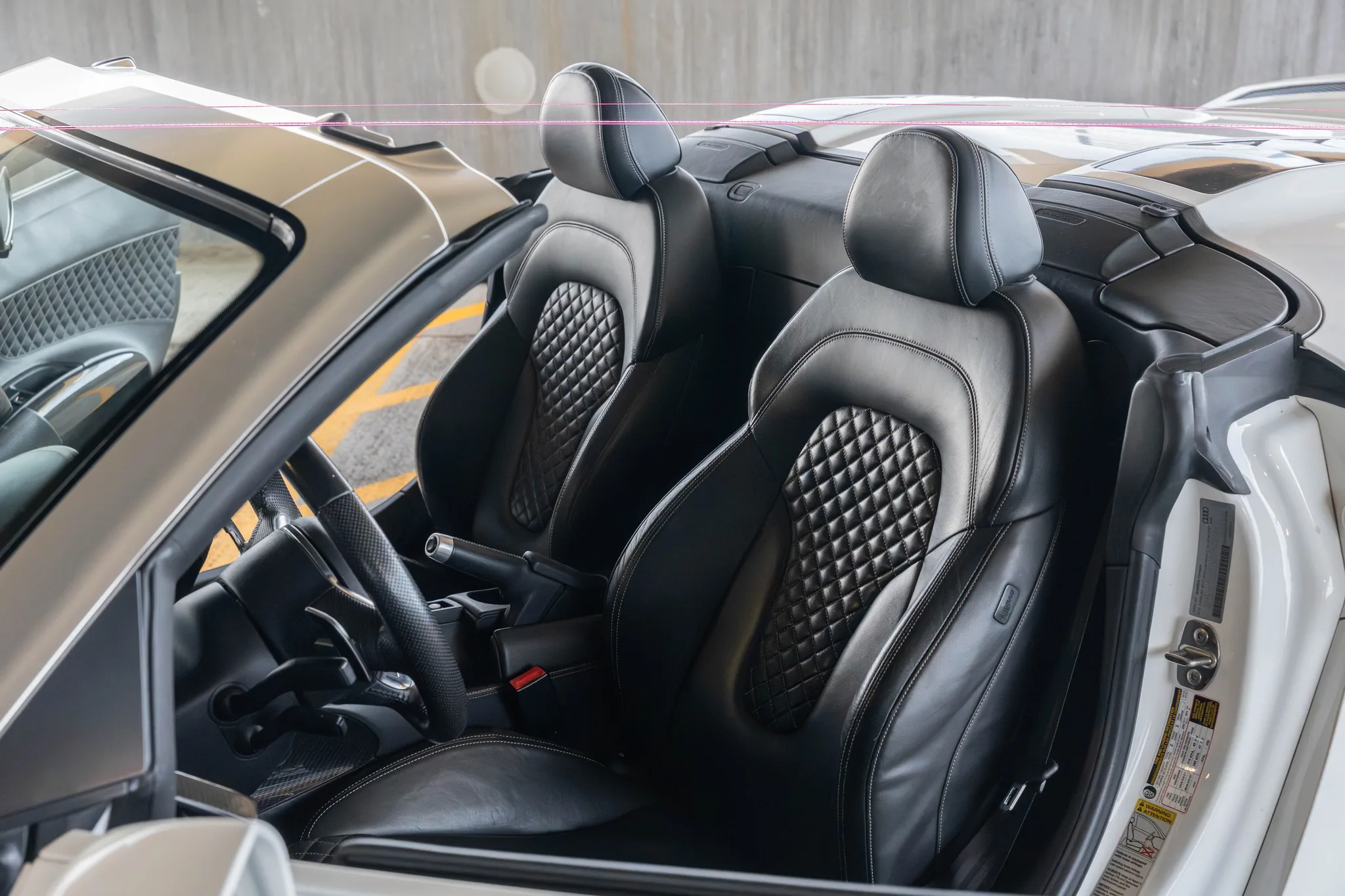 Audi R8 V10 Plus Spyder top-down view — open-air supercar rental in the DMV area