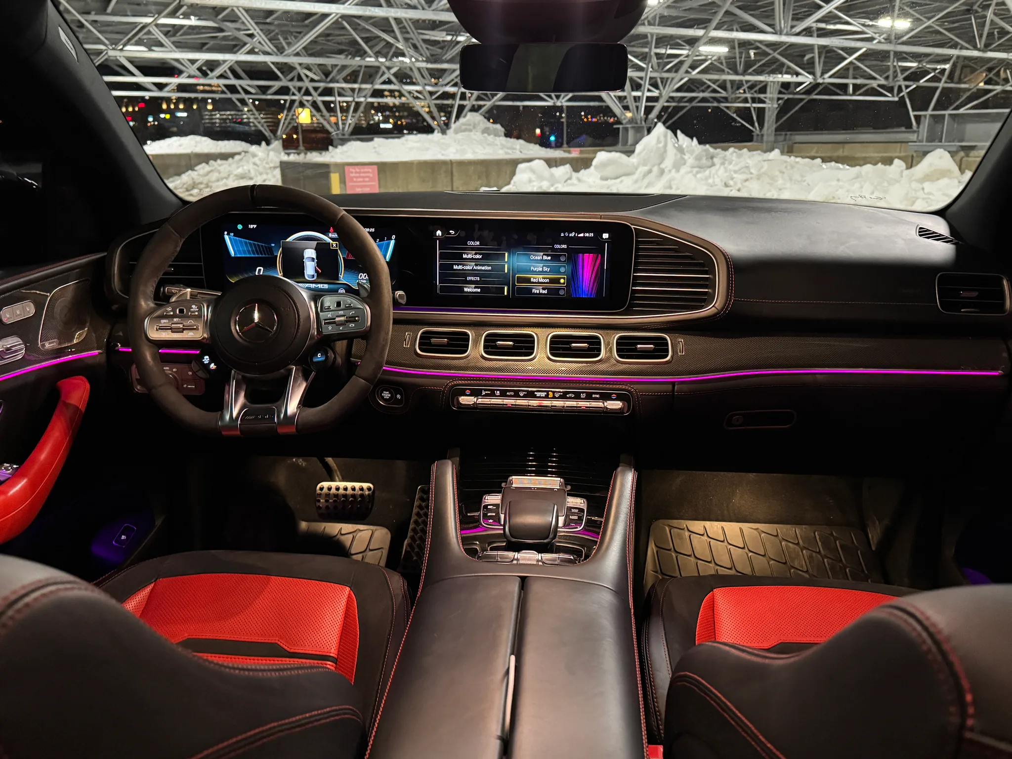 Mercedes-AMG GLE 53 red leather interior — premium cabin with carbon fiber trim